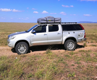 4x4-Kenya toyota Hilux jeep with rooftop  tent and camping equipment 